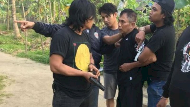 Abdul Nasir Umar (58) saat ditangkap polisi. Ist