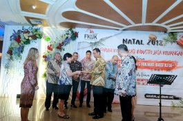 Forum Komunikasi Industri Jasa Keuangan Gelar Natal Bersama
