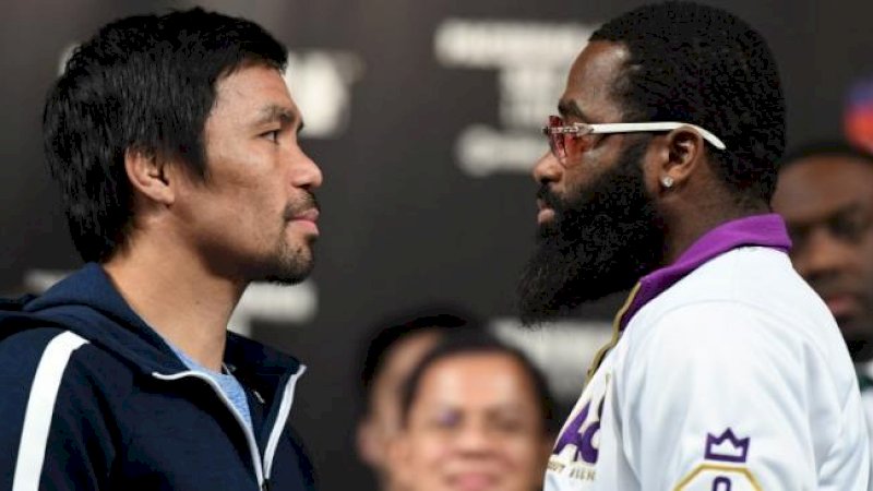 Juara dunia tinju kelas welter WBA asal Filipina, Manny Pacquiao (kiri), saling bertatapan dengan penantangnya, Adrien Broner. Kedua petinju akan bertarung di MGM Grand Garden Arena, Las Vegas, Amerika Serikat, Sabtu (19/1/2019). [AFP/Ethan Miller]