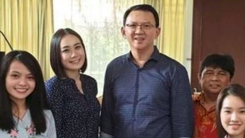 Basuki Tjahaja Purnama didampingi Bripda Puput Nastiti Devi. Ist