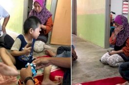 Dua Anak Makan Sisa dari Tempat Sampah, 