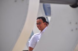 Lapor Jokowi Telah Revisi Pergub Ahok, Anies: Siswa DKI Akhirnya Nikmati Program Nasional