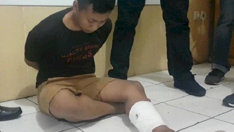 Pelaku pembunuhan, Bahrudin Sanjaya, saat diamankan.