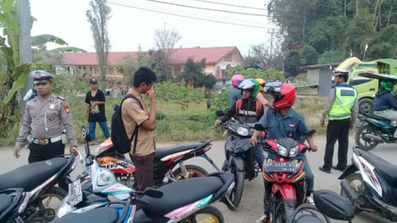 Polsek Rantepao melaksanakan operasi rutin/penertiban di Tagari, Kelurahan Tagari, Kecamatan Tallunglipu Kabupaten, Toraja Utara, Jumat (09/08/2019).