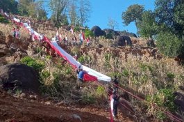 Danny Pomanto dan Ribuan Loyalis Bentangkan Bendera Merah Putih 400 Meter di Bukit Tokka