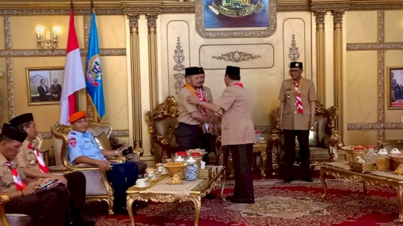 Bupati Sidrap, Dollah Mando selaku ketua Majelis Pembimbing Cabang (Mabicab) Gerakan Pramuka Sidrap, menghadiri apel besar Gerakan Pramuka Provinsi Sulsel, Minggu (18/8/2019).