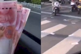 Uang Bertebaran di Jalan, Orang-orang Berlomba-lomba Memungutnya