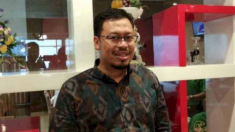 Muzayyin Arif.