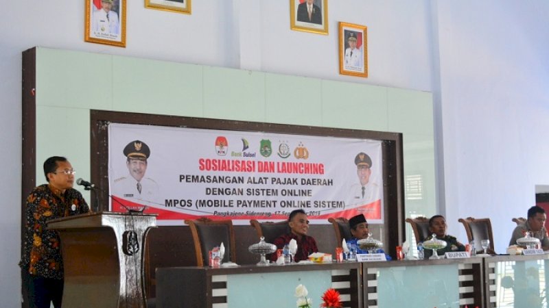 Kepala Kantor Pelayanan dan Penyuluhan Konsultasi Pajak (KP2KP) Sidrap Mohammad Ali Imron menjadi salah satu narasumber Sosialisasi Pajak Daerah dan Retribusi Daerah terkait Sistem Online yang dilaksanakan BPKD Sidrap, Selasa (17/9/2019).
