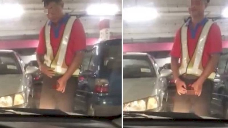 Seorang tukang parkir di sebuah supermarket masturbasi di depan mobil seorang pengunjung.