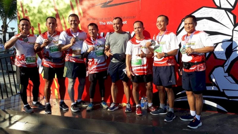Navy Runners Pangkalan Utama TNI AL VI (Lantamal VI) raih medali emas dalam event Internasional Run Makassar Half Marathon 2019 yang digelar Minggu (3/11/2019).