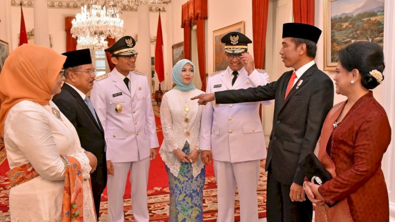 Jokowi dan Sandiaga Uno dalam suatu kesempatan