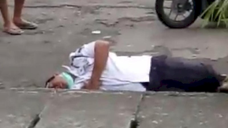 Satpam yang jatuh di Medan karena pusing.