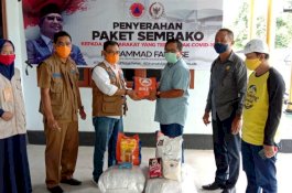 Kerja Sama BNPB-Kemensos, Legislator Muhammad Fauzi Bagikan APD, Masker dan Sembako