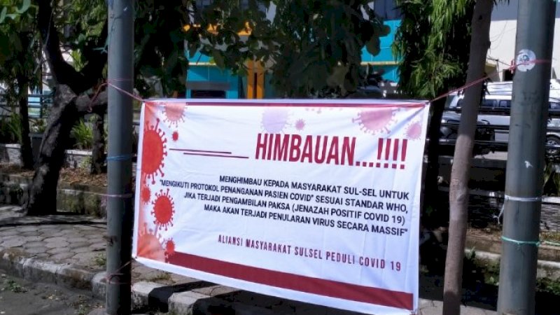 Tebar Spanduk, Aliansi Masyarakat Sulsel: Ambil Paksa Jenazah Bisa Bikin Covid-19 Tambah Parah