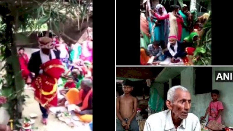 Pria yang menikahi patung kayu di India. (FOTO: ANI)