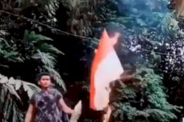 Polisi: Pembakar Bendera Merah Putih Tinggal di Malaysia