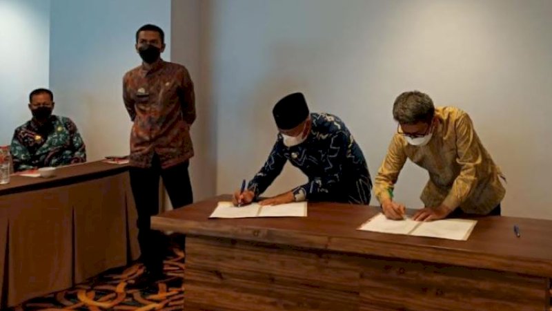 Penyerahan LHP LKPD digelar Badan Pemeriksaan Keuangan (BPK) RI di Hotel D'Maleo Makassar, Jumat (28/5/2021). 