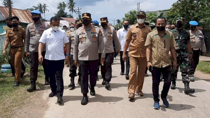 Kunjungan kerja meninjau vaksinasi di Desa Lassang, Kecamatan Polombangkeng Utara (Polut), Kabupaten Takalar pada Selasa 11/1/2022.