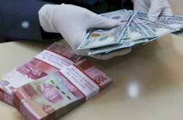 Rupiah Tembus Rp15.000 per Dolar Amerika Serikat
