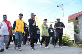 Ruas Jalan Desa Banyuwangi di Luwu Utara Telah Diaspal, Warga Gelar Syukuran