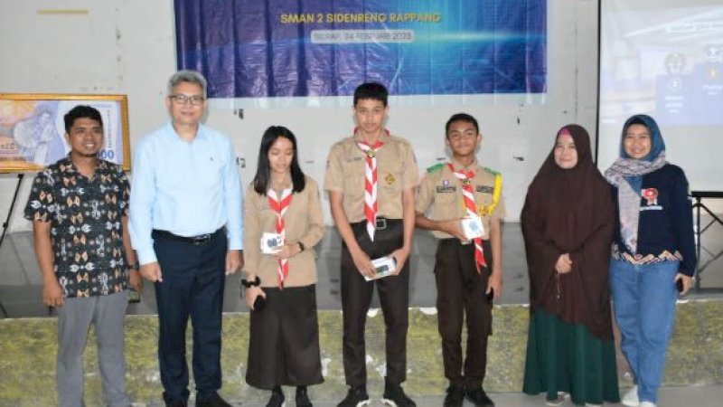 Sosialisasi Cinta Bangga Paham (CBP) Rupiah, Perlindungan Konsumen, dan Quick Response Code Indonesian Standard (QRIS) di Aula SMAN 2 Sidrap, Jumat (24/2/2023),
