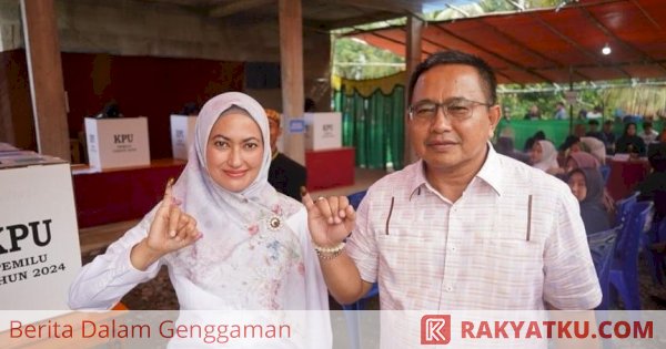 Bupati Lutra Bersama Suami Salurkan Hak Pilih, Ajak Masyarakat Kembali Guyub