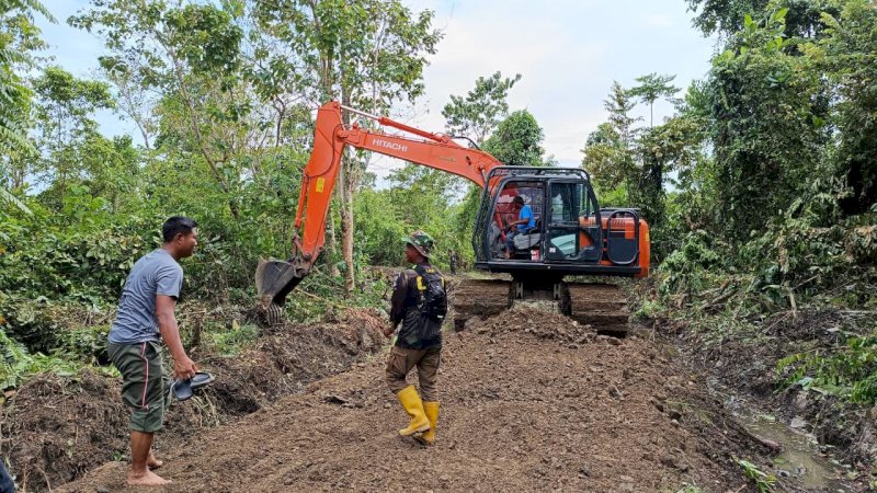 satgas TMMD120 palopo menyelesaikan jalan desa 