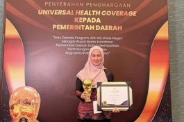 Bupati Luwu Utara Terima Penghargaan Universal Health Coverage