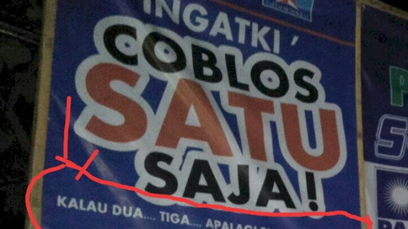 Baliho pasangan Mulyadi Mustamu-Kasmin Makkamula yang sempat dipersoalkan.