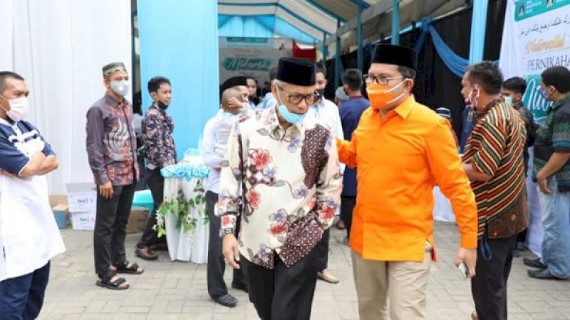 Kandidat Wali Kota Makassar, Mohammad Ramdhan Pomanto, menghadiri acara pernikahan massal di Pondok Pesantren Hidayatullah, Bumi Tamalanrea Permai (BTP), Kota Makassar, Sabtu (19/9/2020).