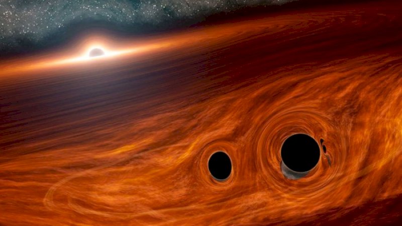 Lubang hitam akibat tabrakan di luar angkasa. (CALTECH/R. HURT (IPAC) VIA NASA)